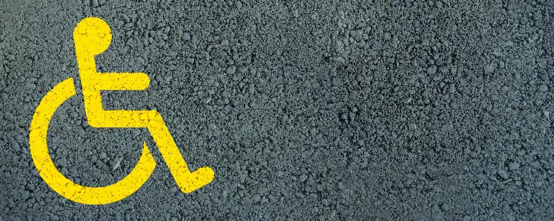 international symbol of access (ISA) in a parking lot.webp