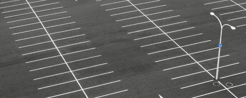 wide view of a newly striped parking lot